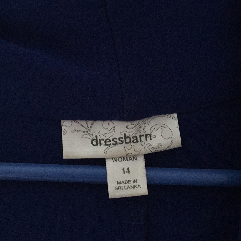 Blue mid-calf, draped neck dress.